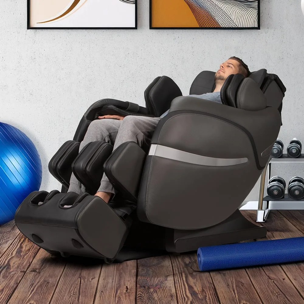 Man relaxing in a Positive Posture Brio Sport massage chair in Graphite in a home gym.
